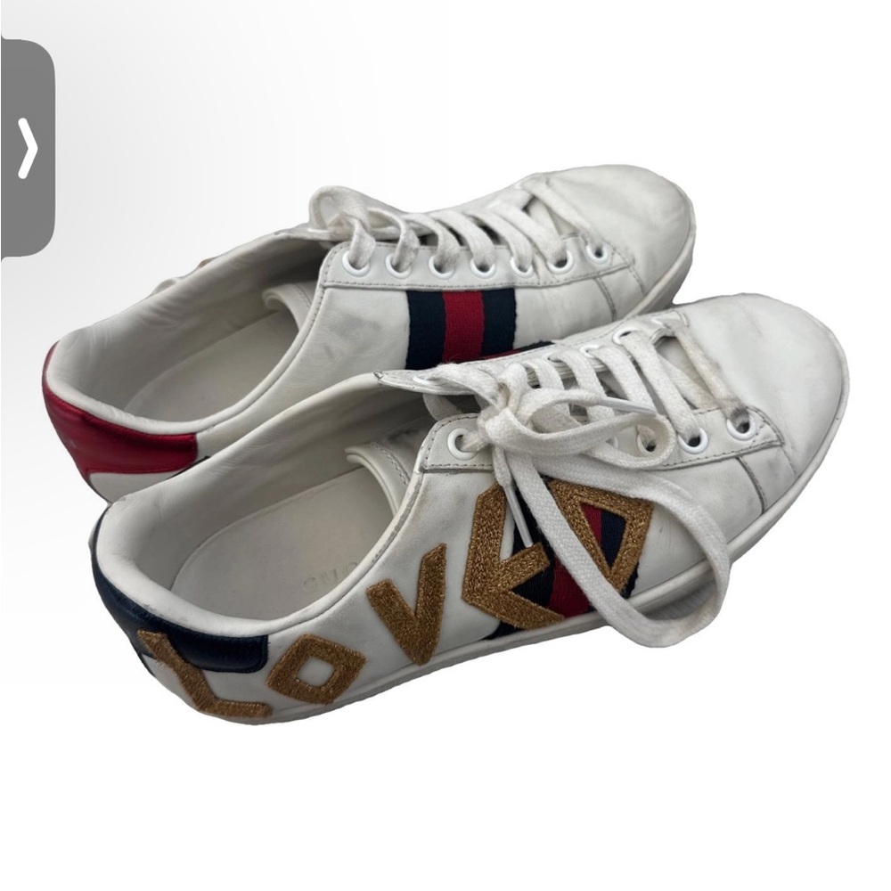 White Sneakers with Red and Blue Stripes